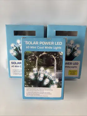 Mainstays 764878630768 3 Pack- Solar Power Led 60 Mini Cool White String Lights Green Wire. 15 Ft Each