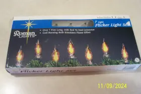 Roman 089945019445 Vtg Flickering Flame Bulbs String 7 Light Set Indoor/outdoor New 2000