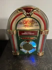 Holiday Musical Light-up Juke Box Plays Christmas Songs By Dyno Used. Price: $29.99.