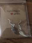 Angel Wing Fashionable Earrings Hook Stainless Steel New. Price: $15.00.