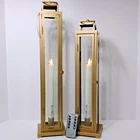 Home Reflections Indoor/outdoor Slim Taper Lanterns Gold 20"H & 17-3/8"H Set Open. Price: $74.95.