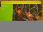 Essential Summer Pink Flamingo String Lights - Set Of 10 , 8' White Cord Used. Price: $9.99.