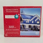 Hometown Traditions 300 Icicle Light Set Clear White Wire 18' New. Price: $8.95.