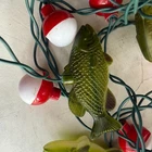 Duane Raver String Of Lights Christmas Fisherman Fishermen Fishing Gift Used. Price: $15.00.