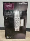 Home Decorators Ansel Stainless Steel Led Indoor/outdoor Wall Lantern New. Price: $40.00.