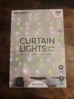 Merkury Innovations Multi-color Cascading Curtain Lights 7 Ft By 6.2 New. Price: $12.00.