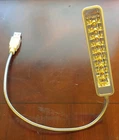 Trademark Gifts #628 Usb Book Light Portable Reading Lamp - Nine Leds New. Price: $5.95.