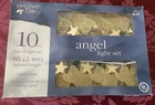 Holiday Time Angel Christmas Tree Light 10 Ct Clear Gold Holding Stars 8FT New. Price: $21.99.