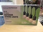 Luminar Outdoor 24' 12-BULB String Lights, Black New Open Box. Price: $25.00.