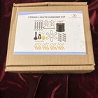 Newleray String Light Hanging Kit W/164 Ft Nylon Coated Stainless Steel 30 Nib. Price: $24.99.