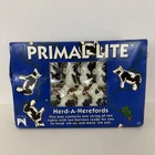Vintage 1993 Sue Scott Design Primal Hereford Cow String Lights Open. Price: $25.00.