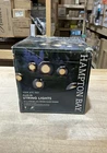 Hampton Bay 8-LIGHT 10FT Black Indoor/outdoor Plugin String W/smoky Glass Open. Price: $24.00.