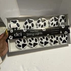 Dei Paw Print String Lights Set Of 10 8.5 Ft. Length. Indoor Outdoor. New. Price: $24.86.