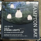 Hampton Bay Outdoor/indoor 10.6 Ft. Plug-in Type Bulb String Light 8 Glass Open. Price: $24.00.