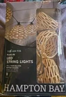 Hampton Bay 10-LIGHT Plug-in Round Globe Bulb Led Rattan String Open. Price: $13.99.