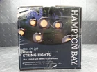 Hampton Bay 8-LIGHT 10 Ft. Black In/outdoor Plug-in String W/ Smoky Glass New. Price: $13.99.