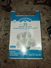 New Holiday Time 35-COUNT Set Of Warm White Led G40 Globe String Lights. Price: $15.99.