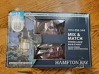 (1) New Hampton Bay String Light Metal Bulb Cages, 12 Black Finish, C7991. Price: $17.49.